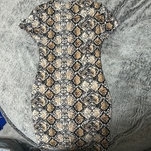 body con dress with snakeskin print.